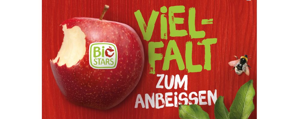 Abbildung eines Apfels mit einem Aufkleber auf dem Biostars steht und daneben der Text
